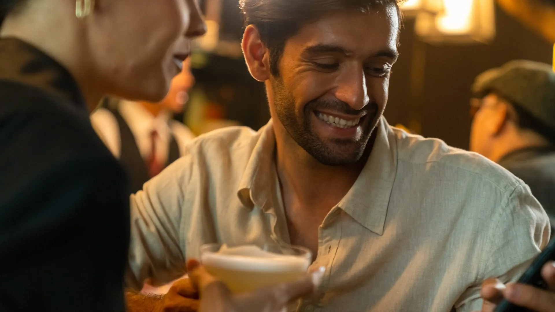 Friends out celebrating with drinks in hand.