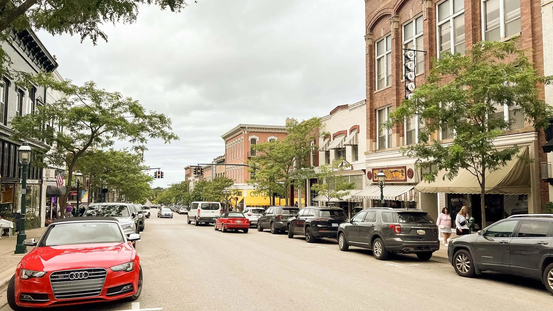 Cars parked on street.