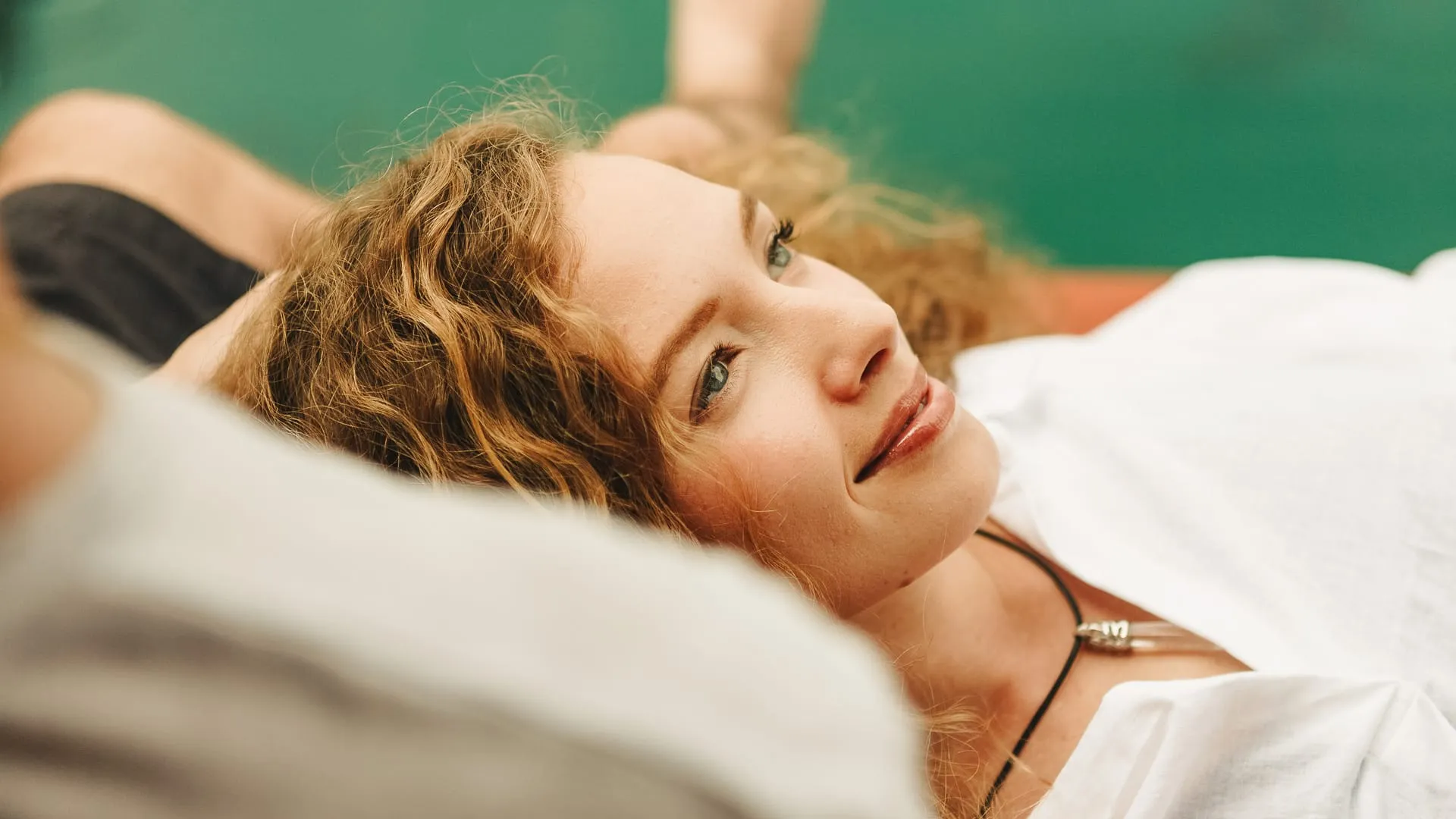 Woman smiling.