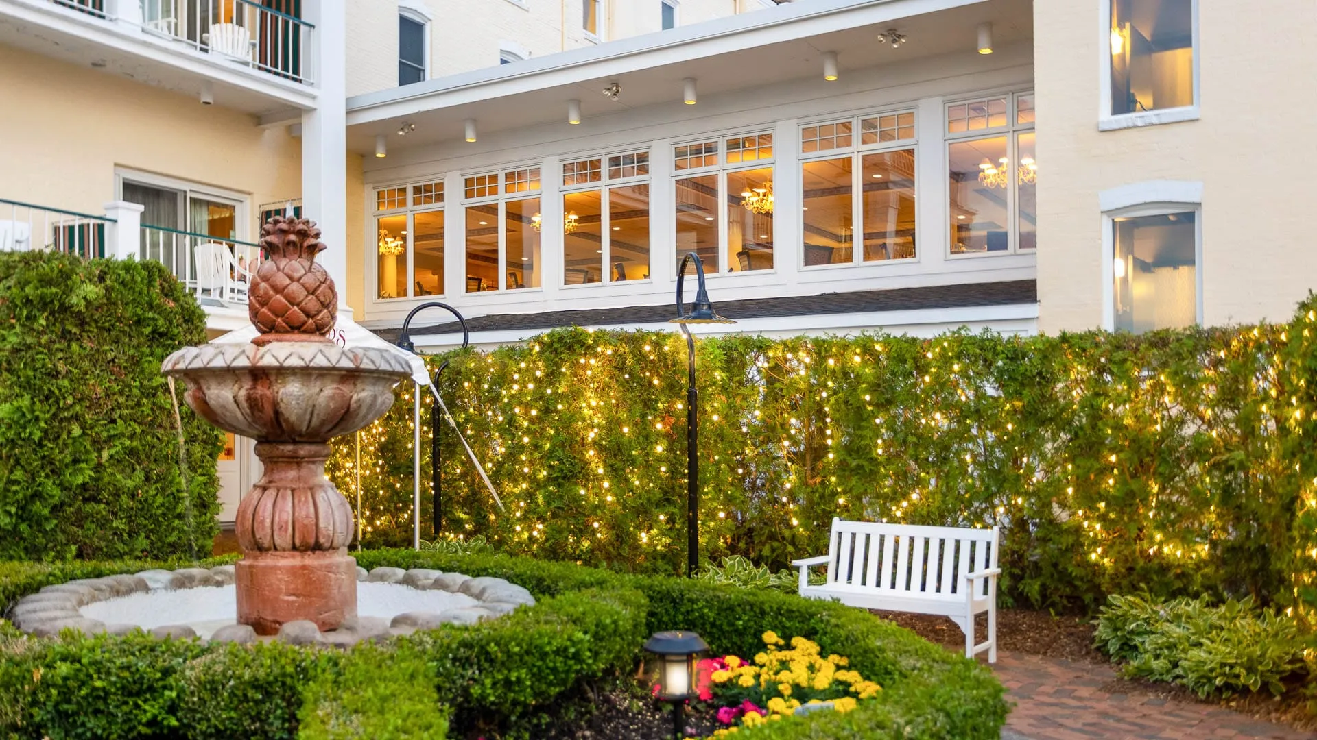 Garden with lights and fountain.