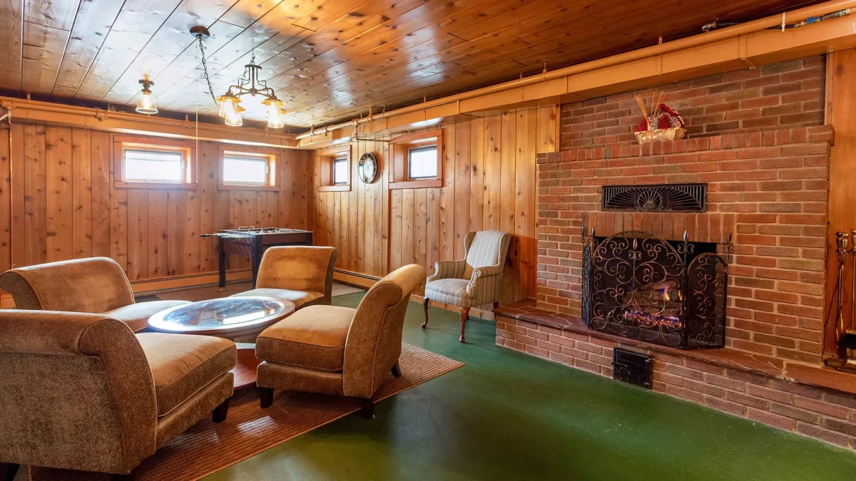 basement seating area with foosball table