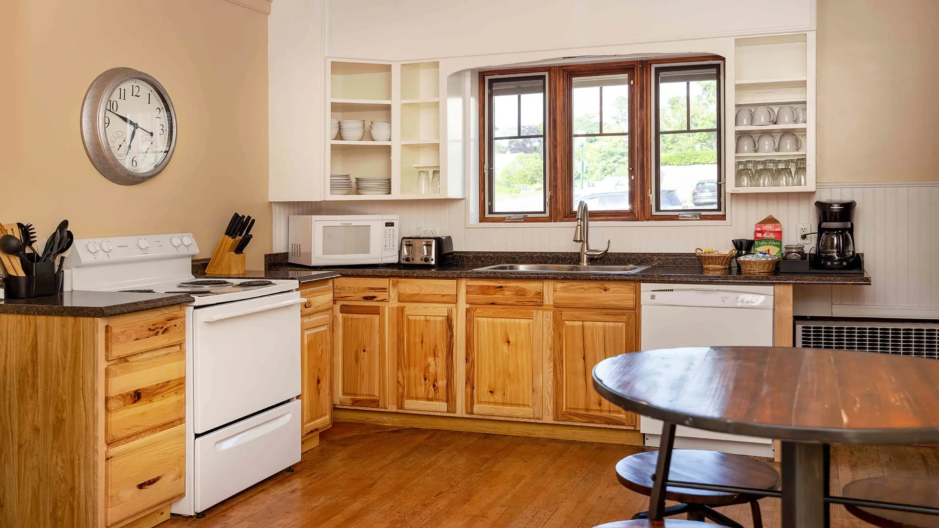 Hotel kitchen view with sink and stove
